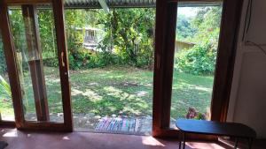 Zahrada ubytování Rustic two bedroom house right by the Chirripo river