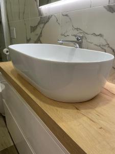 Phòng tắm tại Mini white Apartment +2 ảnh