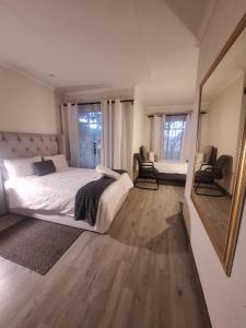 Ένα ή περισσότερα κρεβάτια σε δωμάτιο στο Die Eend