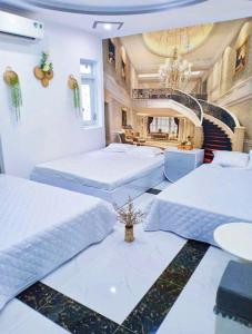 Postel nebo postele na pokoji v ubytování Hoàng Nga Apartment Phan Thiết