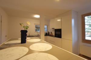 Ένα ή περισσότερα κρεβάτια σε δωμάτιο στο Panorama House