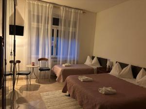 Ένα ή περισσότερα κρεβάτια σε δωμάτιο στο B&B Altea