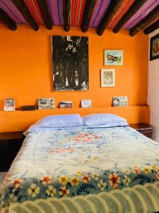 Giường trong phòng chung tại Casa Museo Alcantus