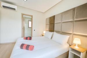 Ένα ή περισσότερα κρεβάτια σε δωμάτιο στο Marrakech Golf City PRESTIGIA +48 φωτογραφίες