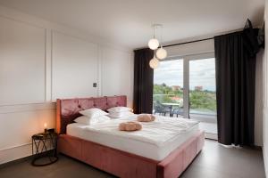 En eller flere senge i et værelse på Villa Lavinia + 108 billeder