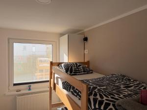 Ένα ή περισσότερα κρεβάτια σε δωμάτιο στο Apartments Mici