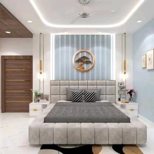 a bedroom with a large bed in a room at Accomodation bnb in Ruiru