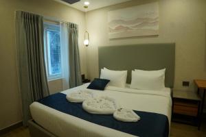 En eller flere senge i et værelse på Trunk and Trolley, Gachibowli, A Luxury Boutique Hotel, Hyderabad + 79 billeder