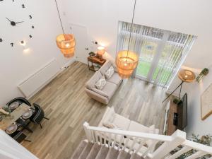 Ένα ή περισσότερα κρεβάτια σε δωμάτιο στο Loco Lodge