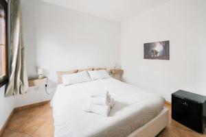 Ένα ή περισσότερα κρεβάτια σε δωμάτιο στο Niki's House Garden