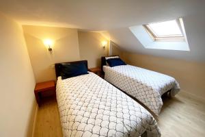 En eller flere senge i et værelse på Plein sud les pieds dans l'eau + 22 billeder