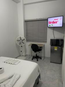 TV a/nebo společenská místnost v ubytování Hotel Orduz Centro Histórico de Cali