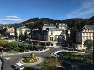 an aerial view of a city with buildings at Appartement duplex 180m² in La Bourboule