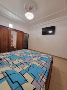 Μια τηλεόραση ή/και κέντρο ψυχαγωγίας στο Appartement deux chambres-salon