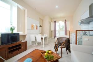 TV a/nebo společenská místnost v ubytování Casa Palacio de Cadiz