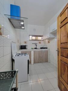 Η κουζίνα ή μικρή κουζίνα στο Appartement deux chambres-salon