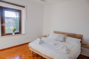 En eller flere senge i et værelse på Dimora del 700'