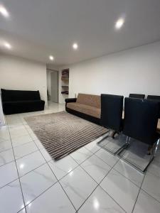 Posezení v ubytování Appartement cosy à Audun-le-Roman avec jardin 50 m²