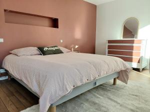 Postel nebo postele na pokoji v ubytování Maison et Bonheur