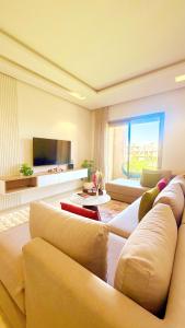 Μια τηλεόραση ή/και κέντρο ψυχαγωγίας στο Marrakech confort et détente à Argan Golf prestigia