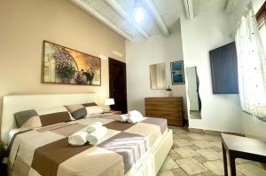 Giường trong phòng chung tại Tenuta Green House +44 ảnh