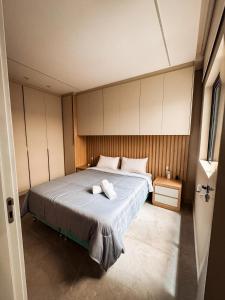 Ένα ή περισσότερα κρεβάτια σε δωμάτιο στο Triplex 3850