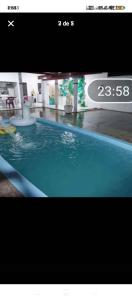 a picture of a swimming pool in a building at Área de Itans in Caicó