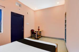 Una cama o camas en una habitación de HOTEL O SAI SOVA