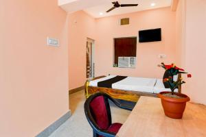 Una televisión o centro de entretenimiento en HOTEL O SAI SOVA