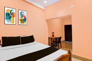 Una cama o camas en una habitación de HOTEL O SAI SOVA