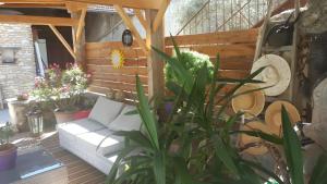 Χώρος καθιστικού στο Chambre Orchidée Chez Mamé Marthe +2 φωτογραφίες