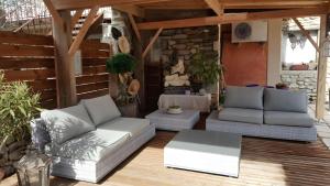 Χώρος καθιστικού στο Chambre Orchidée Chez Mamé Marthe