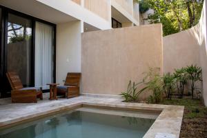 Бассейн в Peregrina Tulum 102A 2BR Luxury Condo или поблизости