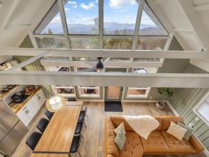 an overhead view of a living room with a large window at Lookout Lodge in Beech Mountain