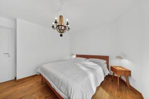 Ένα ή περισσότερα κρεβάτια σε δωμάτιο στο Emotional House in St Moritz Cresta BoB +42 φωτογραφίες