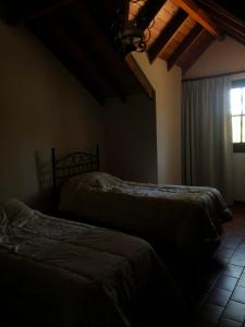 Postel nebo postele na pokoji v ubytování La Dorada Inn