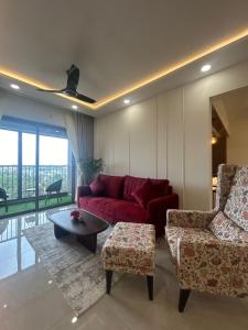 Et opholdsområde på Elite Apartment in Kochi