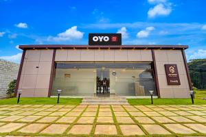 a store front with a noo sign on it at Hotel O ESTORIA HOTEL & RESORT in Kadakola