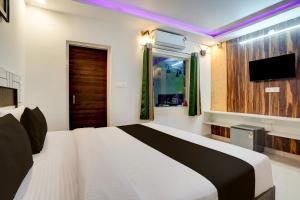 Voodi või voodid majutusasutuse Collection O Uttaranchal University Premnagar toas