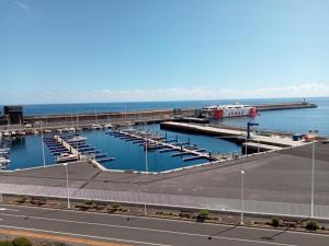 a marina with a bunch of boats in the water at Apartamento Puerto Estaca 1 in Valverde