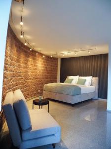 Postel nebo postele na pokoji v ubytování Ein Traum im Turm, historischer Wasserturm Worms