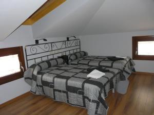 Postel nebo postele na pokoji v ubytování La Cantina del Tobero + 2 fotografie