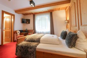 a bedroom with a large bed in a room at Chalet Madlein in Ischgl