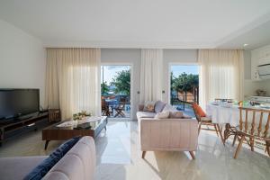 TV a/nebo společenská místnost v ubytování Villa Riva