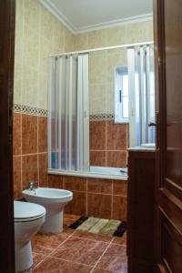 Koupelna v ubytování D'Ouro Meu House + 35 fotografií