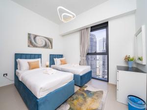 Ένα ή περισσότερα κρεβάτια σε δωμάτιο στο Stunning 2 bed dubai mall burj khalifa downtown ACT 1 +70 φωτογραφίες