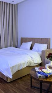 Ένα ή περισσότερα κρεβάτια σε δωμάτιο στο استديو درب الحرمين