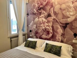 Ένα ή περισσότερα κρεβάτια σε δωμάτιο στο Camere e attico al mare +25 φωτογραφίες