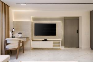 Televiisor ja/või meelelahutuskeskus majutusasutuses Zahir 801