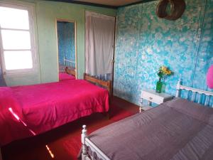 Una cama o camas en una habitación de Biodiversidad